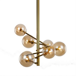 Изображение товара Потолочная люстра на штанге MX19009070-6B DeLight Collection Globe Mobile gold в форме шара