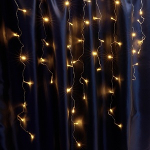 Изображение товара Светодиодная гирлянда Feron CL23 41633 бахрома, статичная, 5,3м*0,8м + 3м 220V желтый c питанием от сети, прозрачный шнур