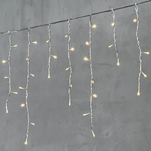 Изображение товара Гирлянда Бахрома 3,1 x 0,5 м тепло-белая 24В, 150 LED, провод прозрачный ПВХ, IP54 Laitcom PIL150-10-1WW