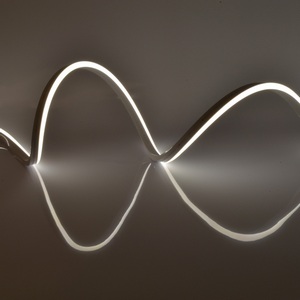 Изображение товара Светодиодная гибкая герметичная лента катушка 15м белый свет 4000К Uniel Neon ULS-N11-2835-120LED/m-8mm-IP67-DC24V-10W/m-15M-4000K катушка в герметичной упаковке